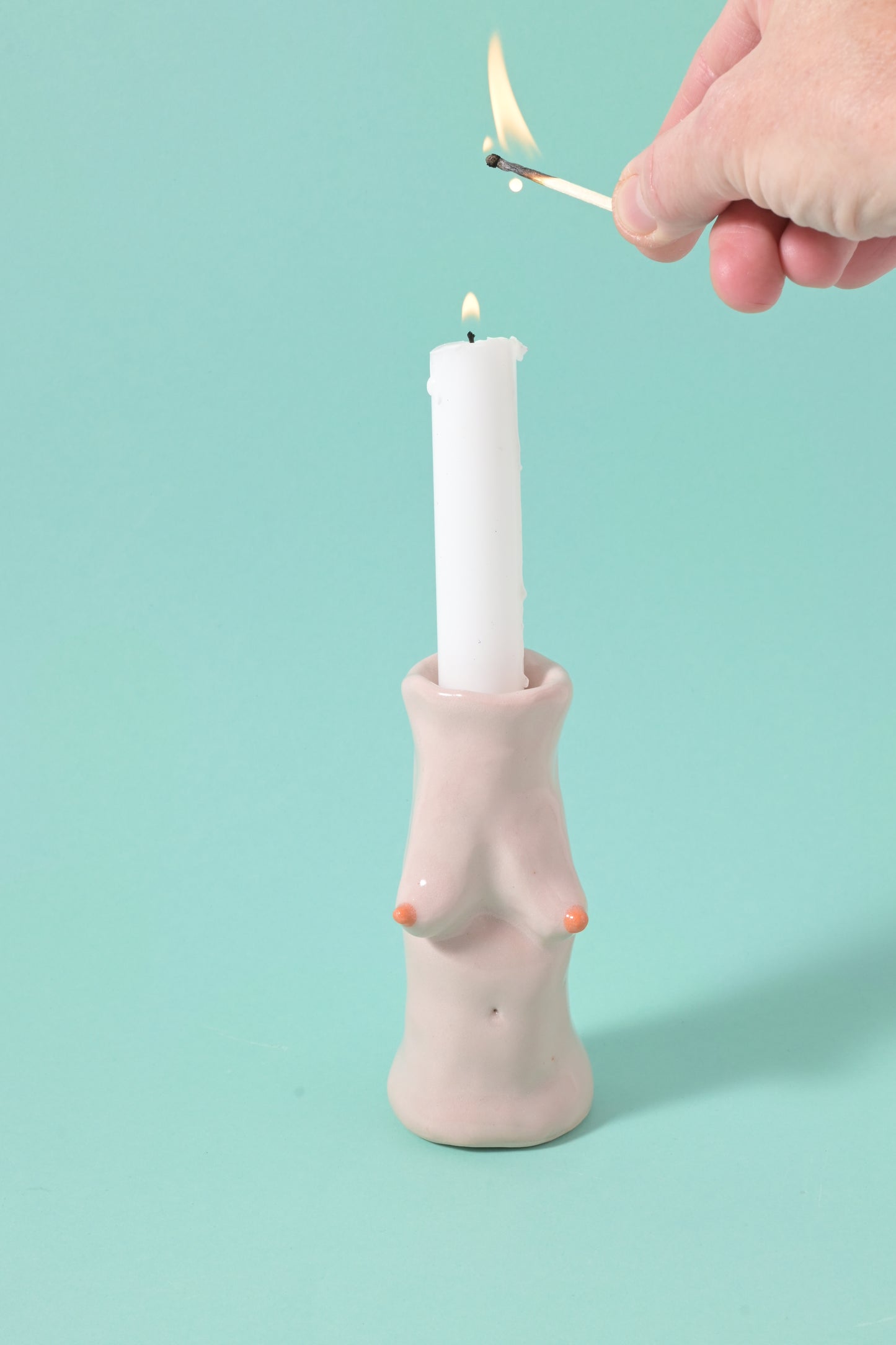 Candle , vase + tits